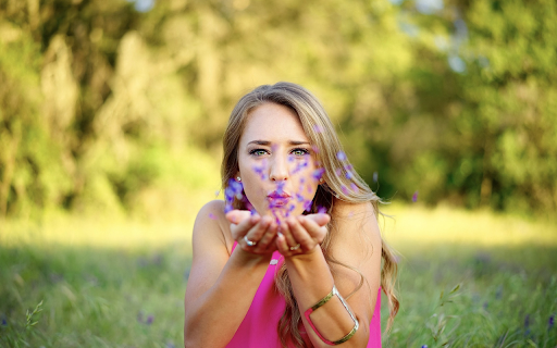 Girl blowing flower petals from Chrome web store to be run with OffiDocs Chromium online Girl blowing flower petals from Chrome web store to be run with OffiDocs Chromium online
