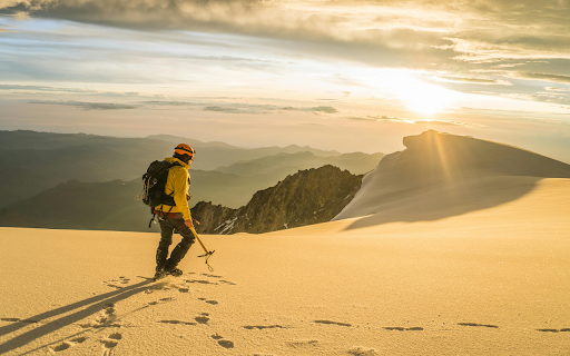 Man Hiking in Mountains at Sunset from Chrome web store to be run with OffiDocs Chromium online Man Hiking in Mountains at Sunset from Chrome web store to be run with OffiDocs Chromium online