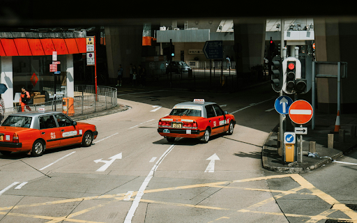 Red cars driving on street in city from Chrome web store to be run with OffiDocs Chromium online Red cars driving on street in city from Chrome web store to be run with OffiDocs Chromium online