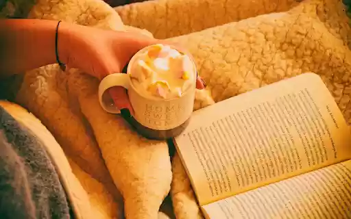 Person Holding Mug Filled With Pastry Beside Open book from Chrome web store to be run with OffiDocs Chromium online Person Holding Mug Filled With Pastry Beside Open book from Chrome web store to be run with OffiDocs Chromium online